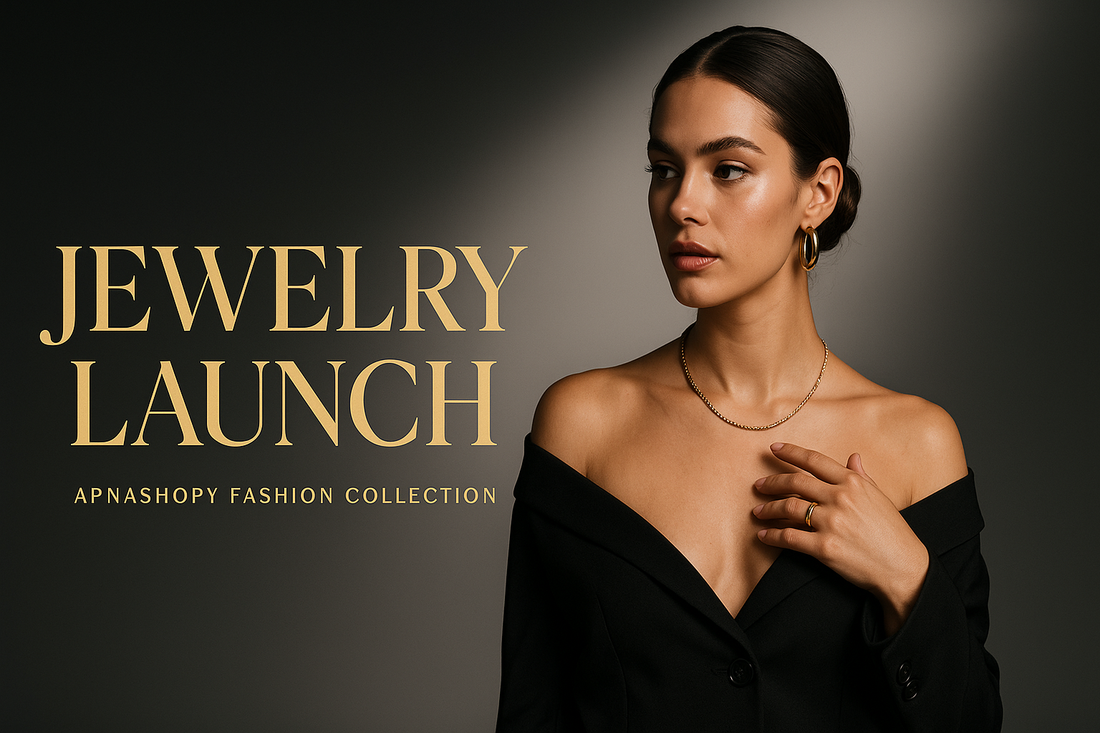 Modern fashion advertisement banner for a new jweelry launch. A clean studio background with gradient black and white tones, spotlight effect on a premium . Bold stylish golden text  in the center, with smaller text below: Apnashopy Fashion Collection. Minimalist, high-fashion editorial look, sharp lighting, Instagram-style aesthetic, 1920x1080 pixels."